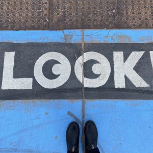 Inspiration. The word 'Look' painted on the ground.